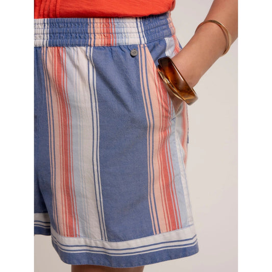Close-up view of the hip pockets on a pair of women's Brakeburn Constanza beach shorts in a blue and coral vertical stripe pattern with an elastic waist.