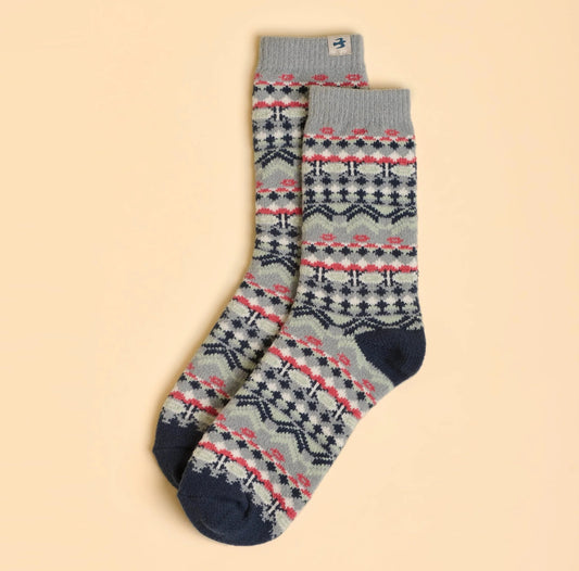 Pair of Nordic patterned womens Brakeburn socks on a beige background