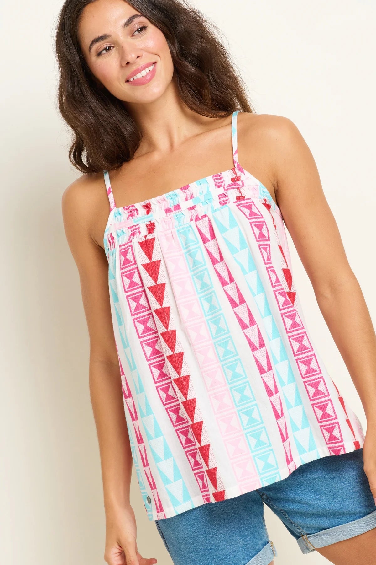 Brakeburn womens Rosie vest with colorful geometric pattern and thin shoulder straps worn with denim shorts