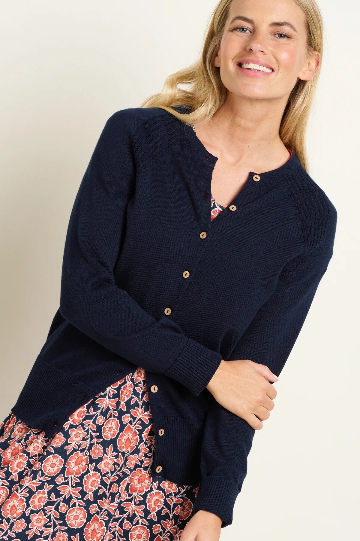 Brakeburn women's knitted pop detail cardigan in navy with wooden buttons.