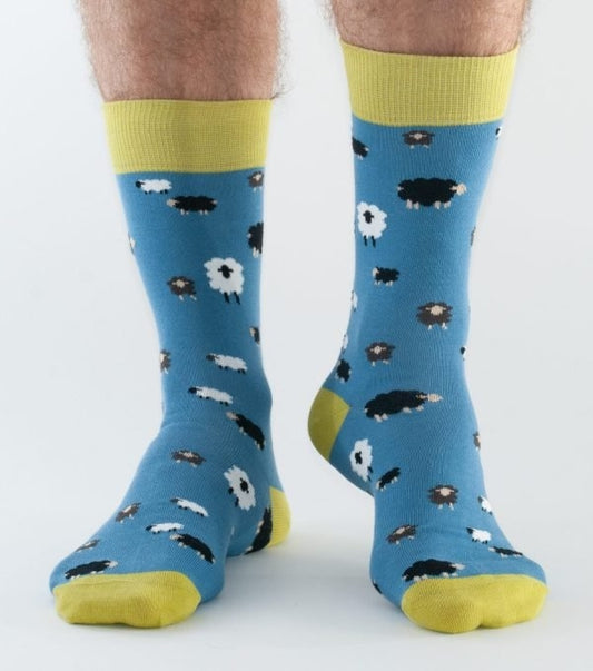 Men's bamboo socks from Doris & Dude in blue with a sheep pattern.