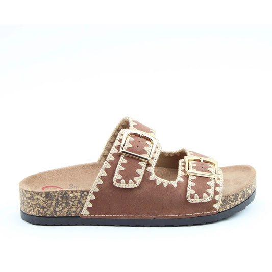 Side view of a women's Heavenly Feet Sandy double buckle slider sandal in Bark Brown with embroidered straps.