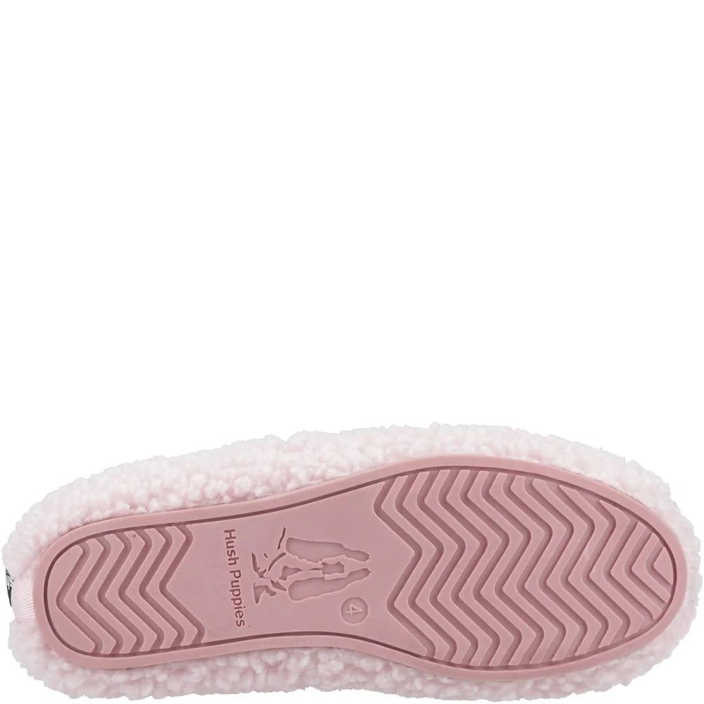Pink slipper sole with textured pattern on a white background