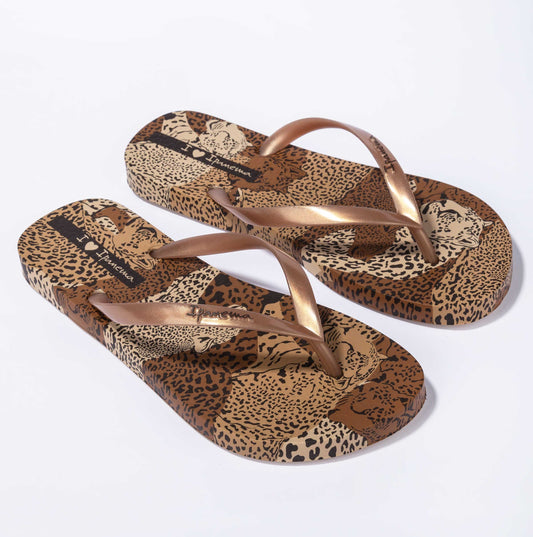 Front view of Ipanema womens animal print flip flops with brown metallic straps and leopard pattern sole