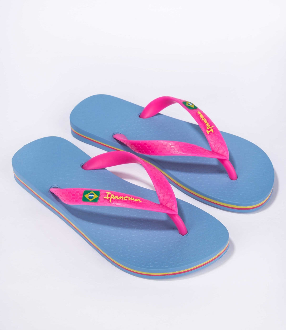 Front view of Ipanema womens flip flops blue pink Brazil with colourful sole and Brazilian flag detail