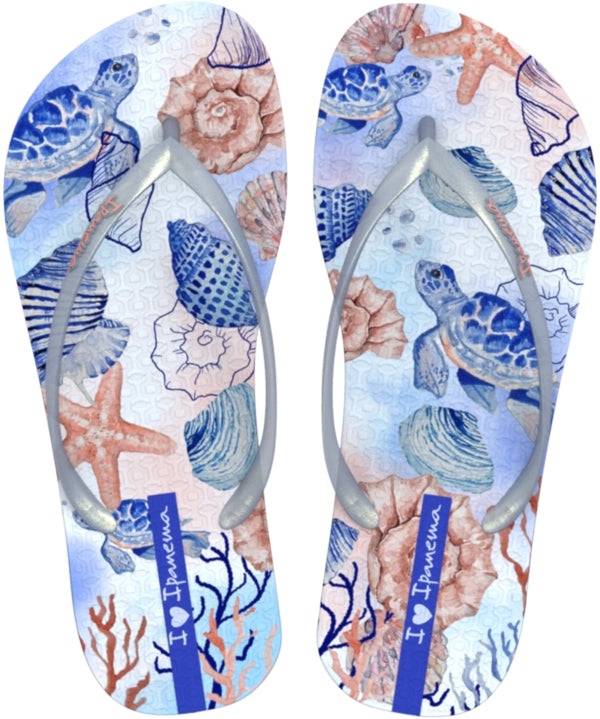 Ipanema womens tropical sea print flip flops with blue sea turtle and shell design