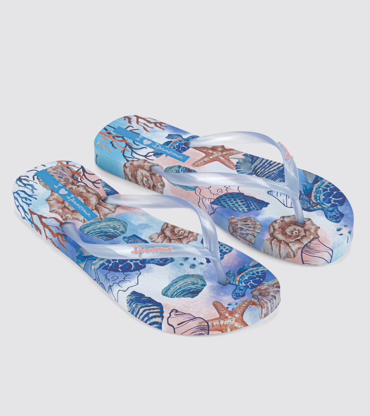 Ipanema womens tropical sea print flip flops with blue and coral shell and starfish design