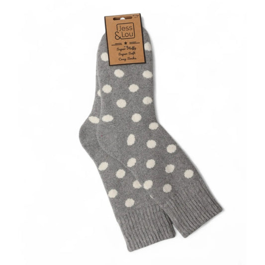 Womens grey sock with white polka dots on a white background, featuring a 'Jess & Lou' label.