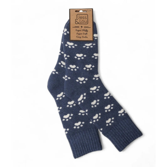 Navy blue womens Jess and Lou cosy socks with white paw prints on a white background, featuring a brand tag.