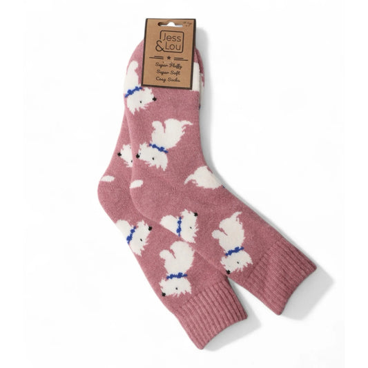 A pair of womens Jess and Lou pink wool socks with a white dog patten on a white background