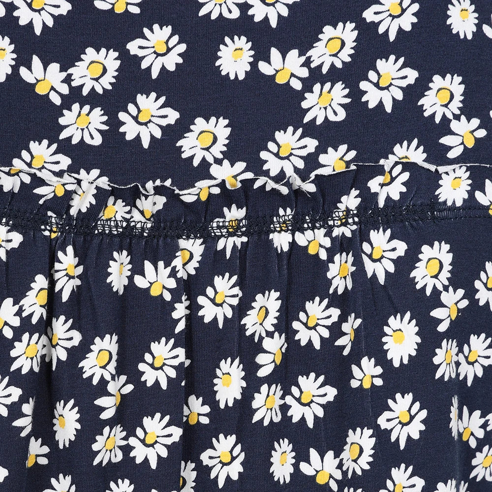 Lazy Jacks floral tunic featuring a navy background with white and yellow daisy prints