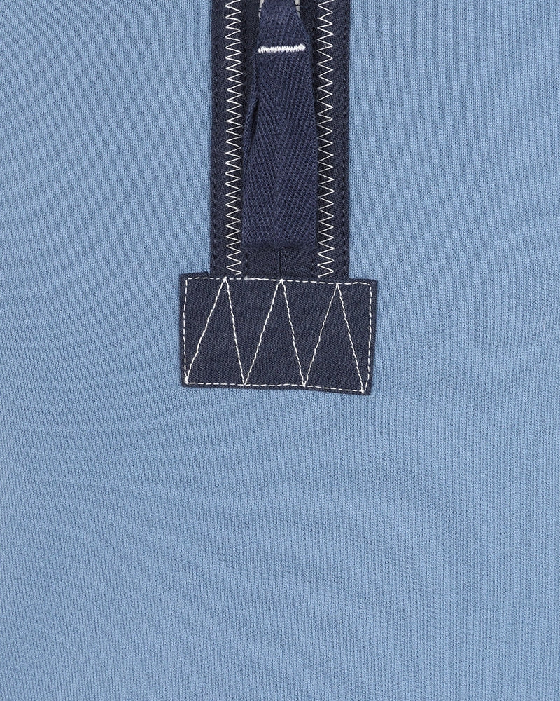 Close-up of Lazy Jacks kids Porthleven sweatshirt in light blue with contrasting stitching details