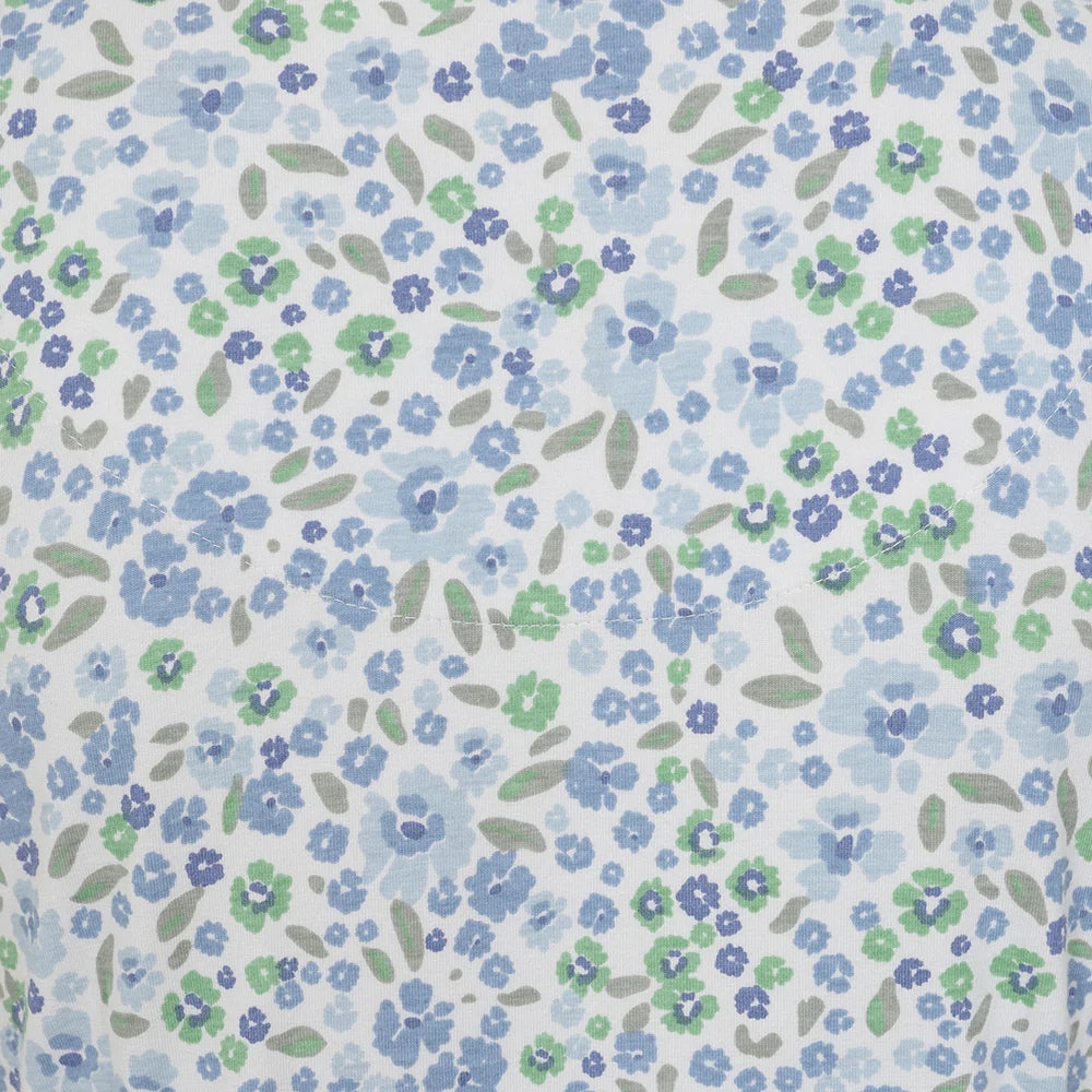 Close-up of Lazy Jacks womens floral print dress fabric with blue and green flowers pattern