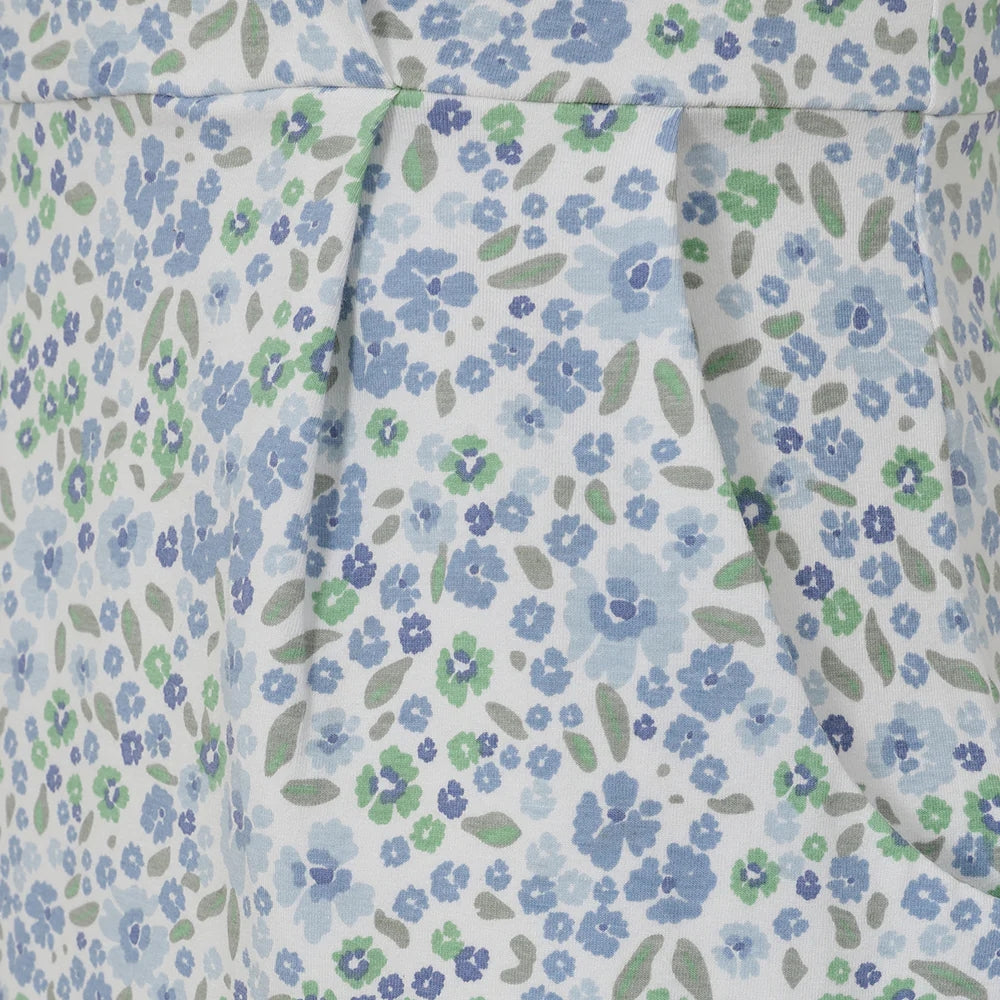 Close-up of Lazy Jacks womens floral print dress fabric with blue and green flowers