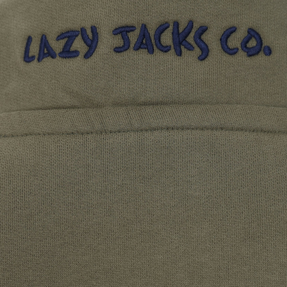 Close-up of Lazy Jacks womens sweatshirt khaki fabric with navy embroidered logo detail