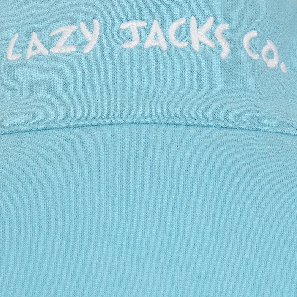 Close-up of light blue fabric with Lazy Jacks Co logo on Lazy Jacks womens zip sweatshirt spearmint
