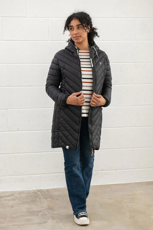 Lighthouse black padded coat womens worn by model with striped shirt and jeans in casual setting