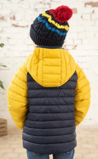 Back view of child wearing Lighthouse kids padded coat navy yellow with hood and quilted design