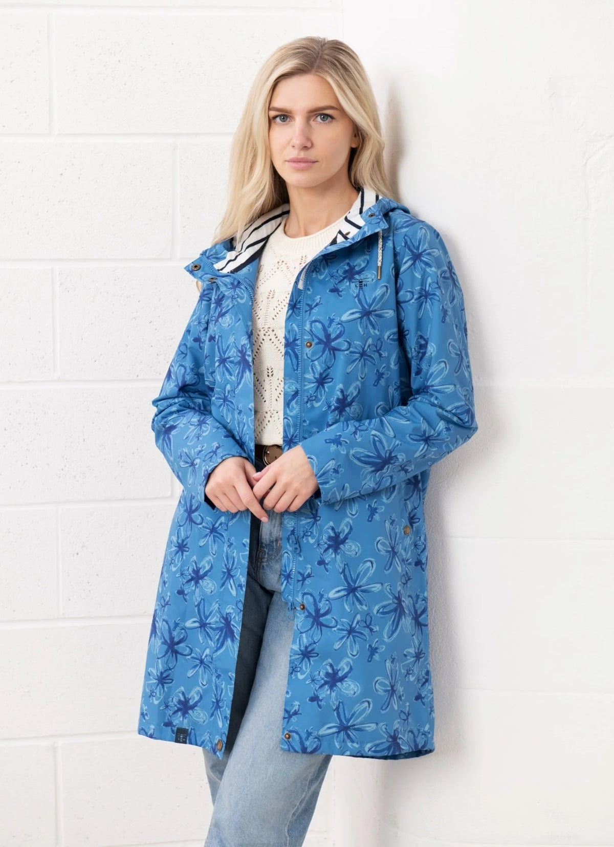 Lighthouse Womens blue floral jacket with hood worn by model in casual outfit