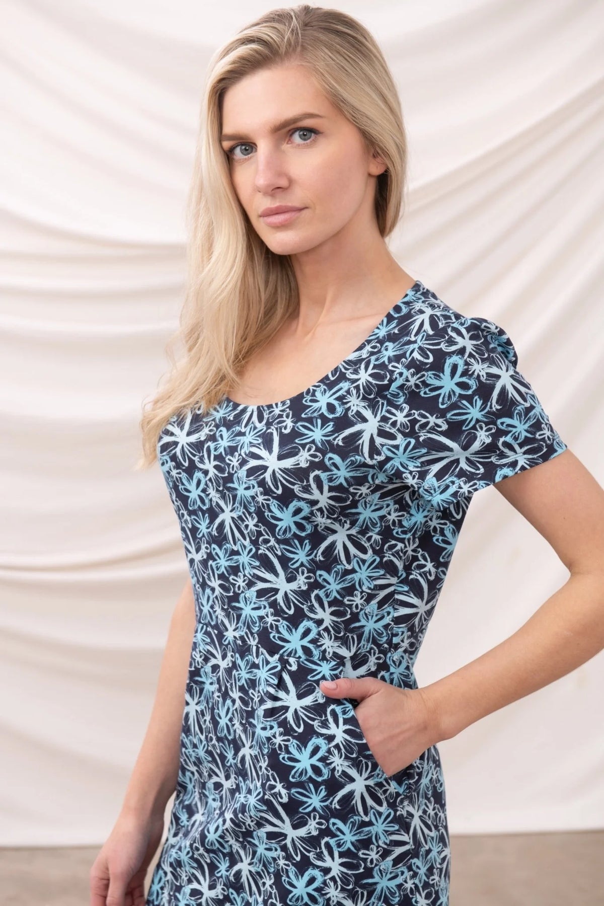 Lighthouse womens floral dress navy with short sleeves and blue flower pattern on model