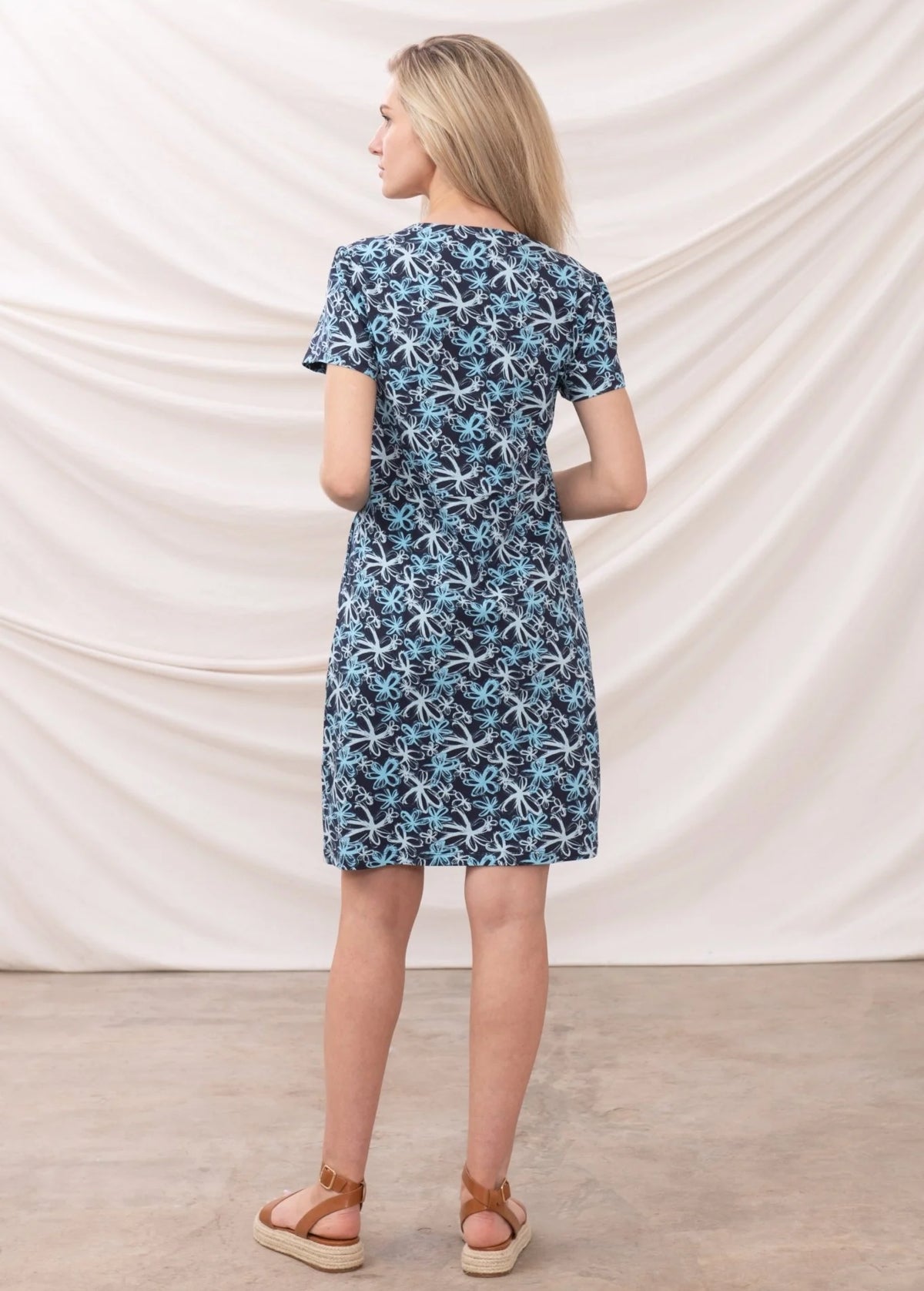 Back view of Lighthouse womens floral dress navy with short sleeves and knee-length fit
