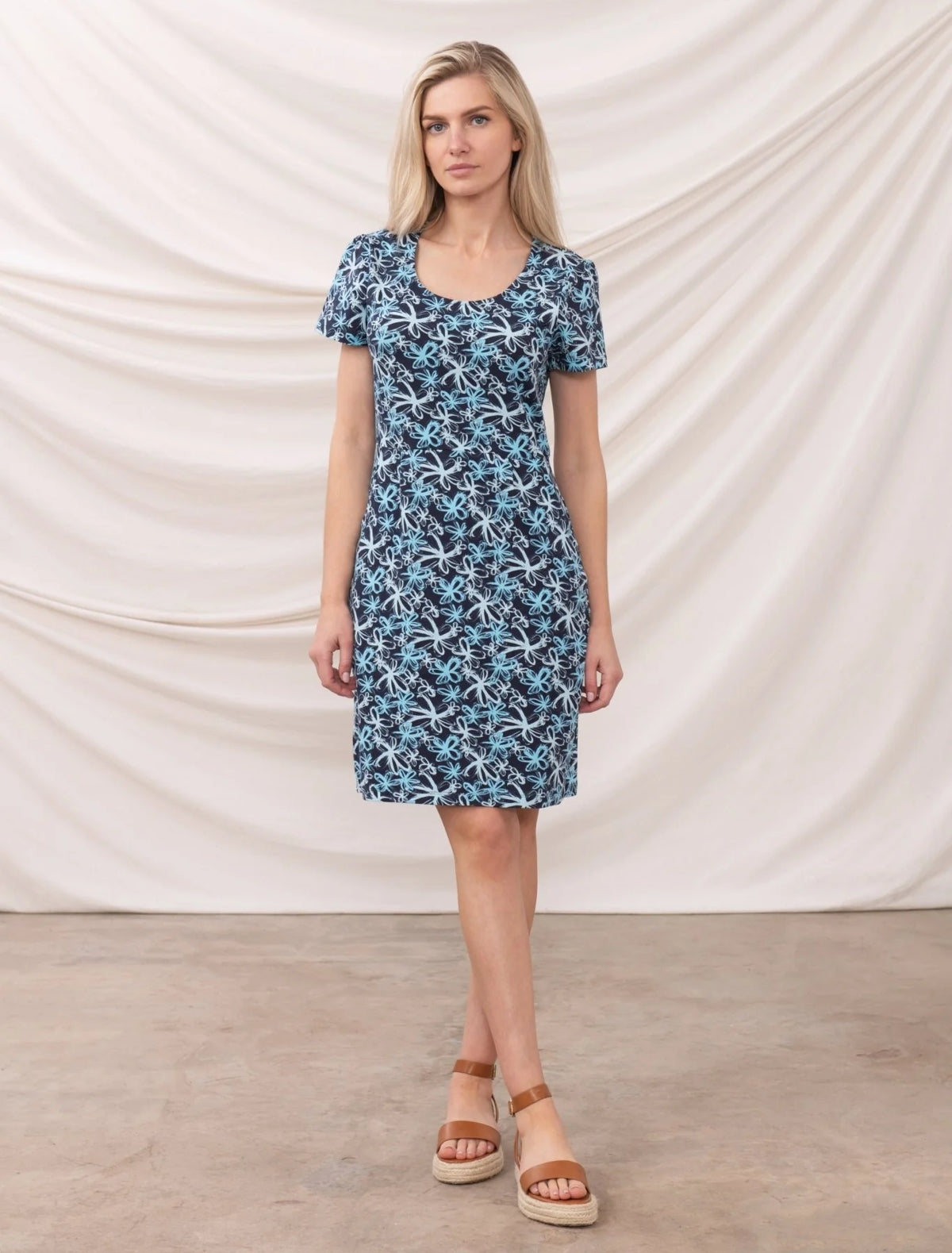 Lighthouse womens floral dress navy with short sleeves and knee-length fit on model