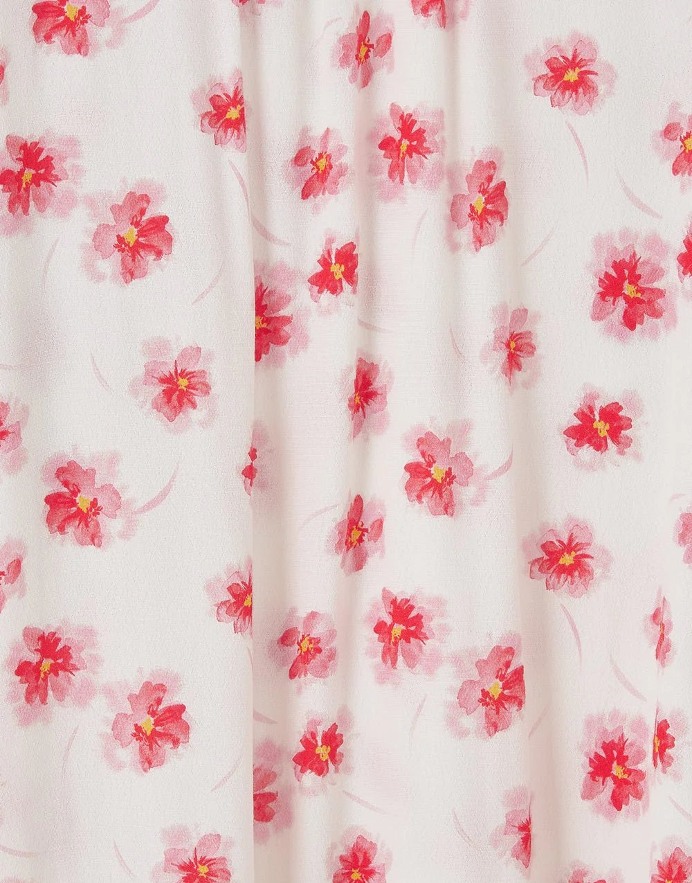 Close-up of fabric with pink and red floral pattern on Lighthouse womens Lola blouse