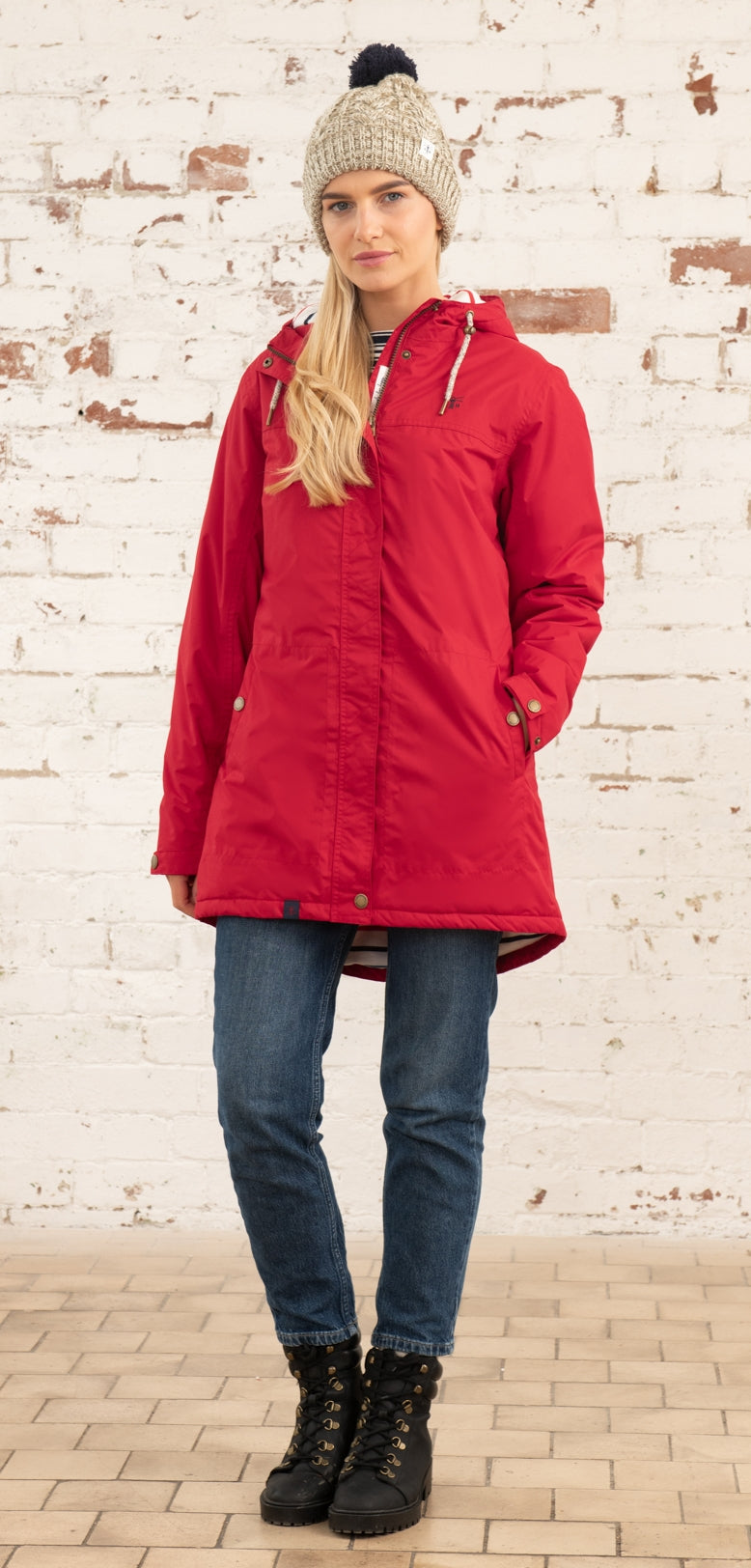 Waterproof women's Eva Long padded rain jacket in Red from Lighthouse.