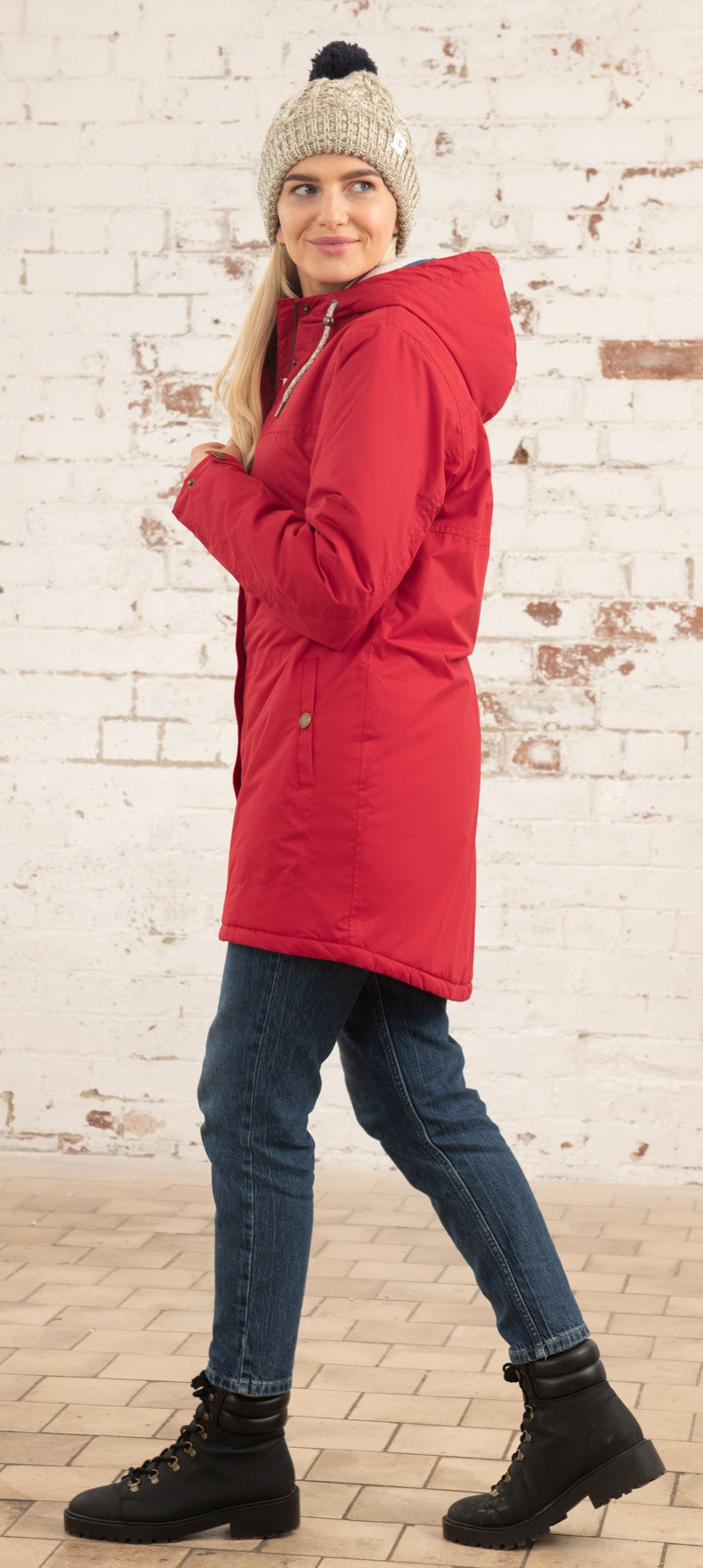 Women's padded waterproof Eva Long rain coat from Lighthouse in Red.