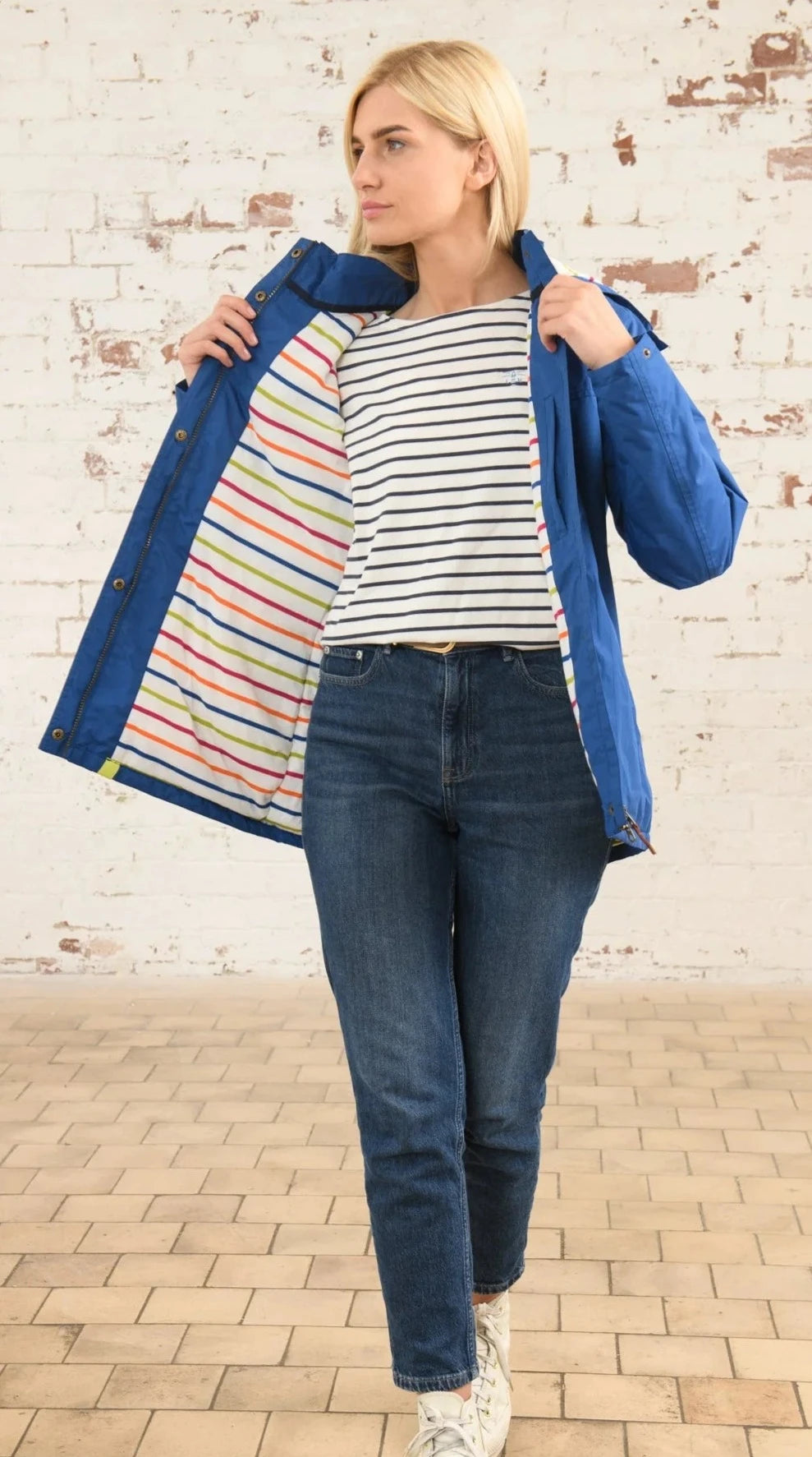 Lighthouse women's Blue waterproof Eva paddded coat with multicoloured stripe lining.