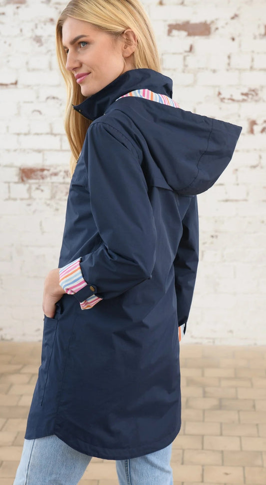 Waterproof women's hip length Rebecca jacket from Lighthouse in Navy.