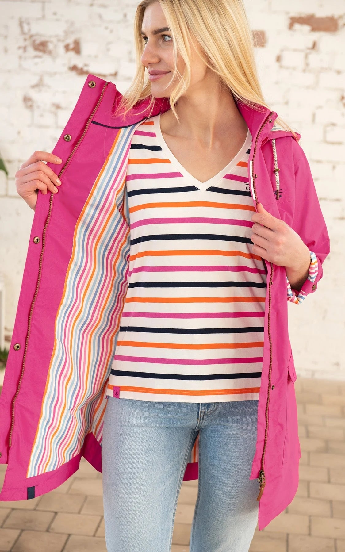 Lighthouse women's Rebecca waterproof jacket in Azalea Pink with multicoloured stripe lining.