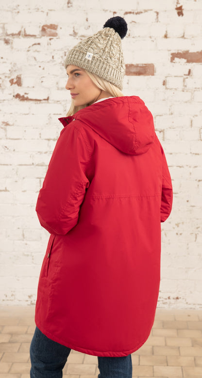 Red women's waterproof Eva Long rain jacket from Lighthouse.