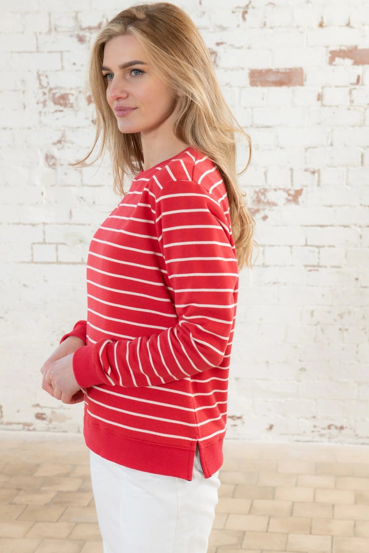 Women's Poppy Red and white stripe Seaside sweatshirt from Lighthouse with elasticated cuffs, bottom hem and side slits.