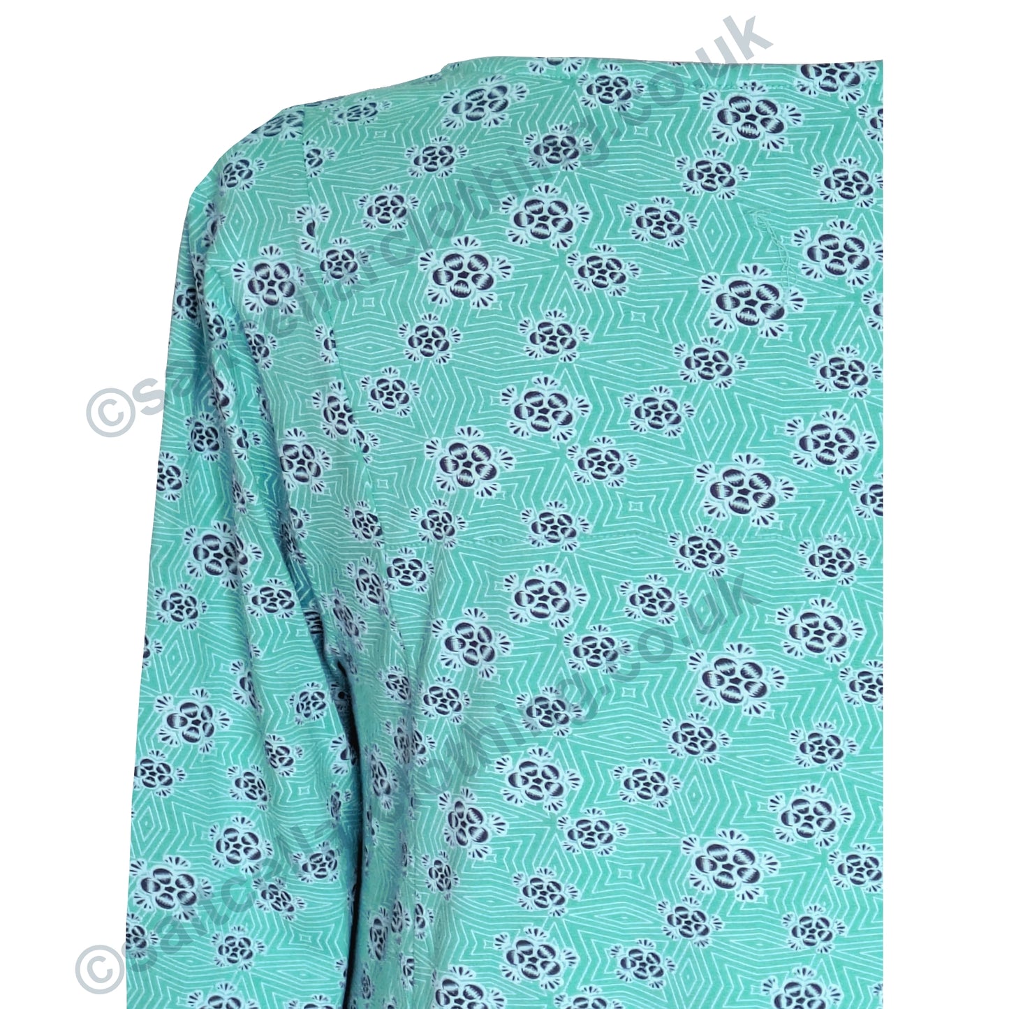 Close up of material of a womens Mudd & Water Francoise tunic in Ceramic turquoise with a geometric floral print on a white background