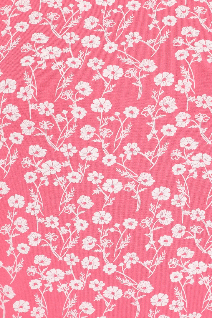 Pink women's Mudd & Water Francoise tunic with a white floral Meadow pattern.