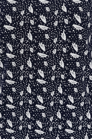 Navy women's Mudd & Water Francoise tunic with a white polka dot and leaf pattern.