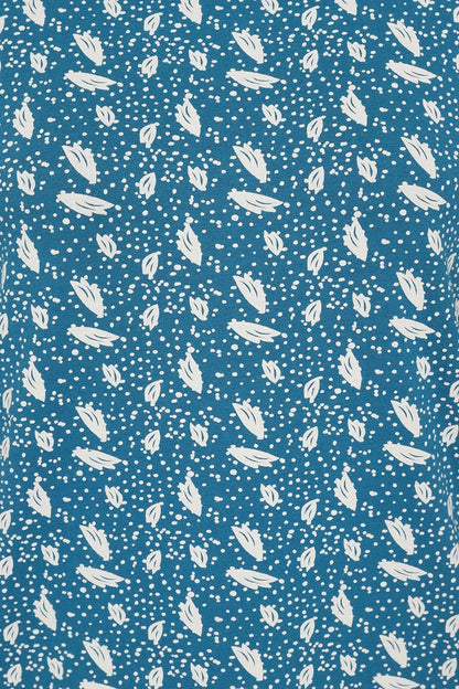 White polka dot and leaf pattern on a Teal Blue background women's Francoise tunic from Mudd & Water.