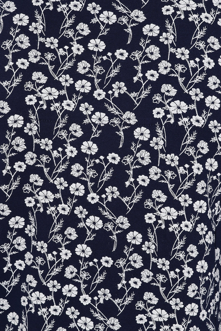 Navy women's Mudd & Water Francoise tunic with a white floral Meadow pattern.