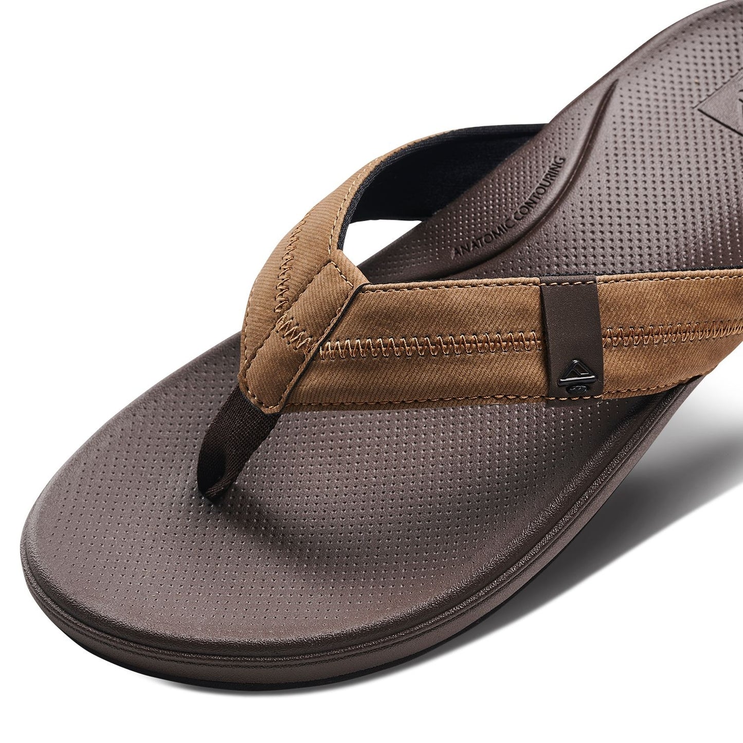 Reef mens cushion flip flops featuring a comfortable padded footbed and durable strap design