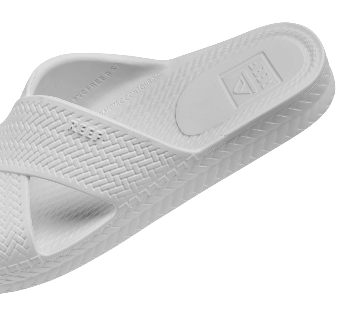 Reef Womens Slide Sandals White with textured crisscross straps and cushioned footbed for comfort