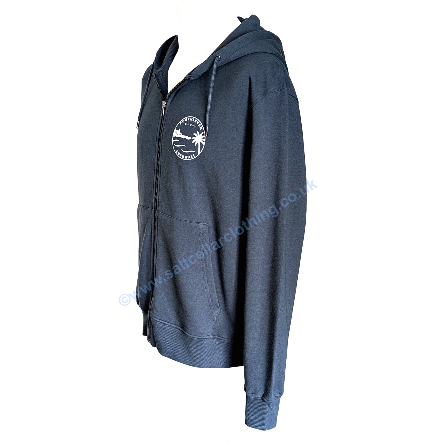 A Petrol Blue full zip hoodie shown from the side, featuring a small white circular graphic print featuring a clocktower and harbour, palm tree, waves, and the text 'PORTHLEVEN Salt Cellar' and 'CORNWALL'.