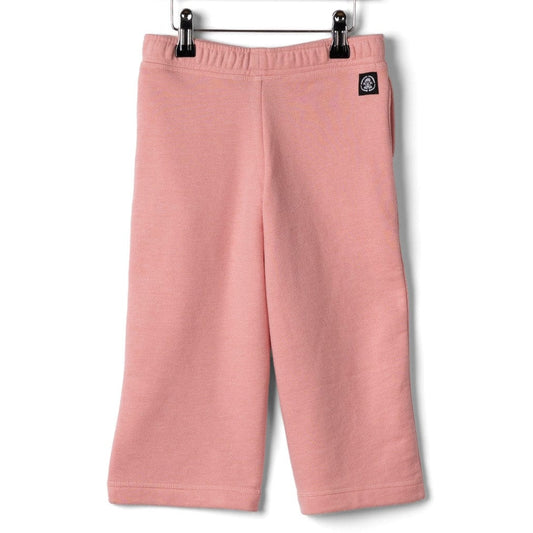 Back view of Saltrock kids Norie wide leg jogger trousers in pink with a small black logo label