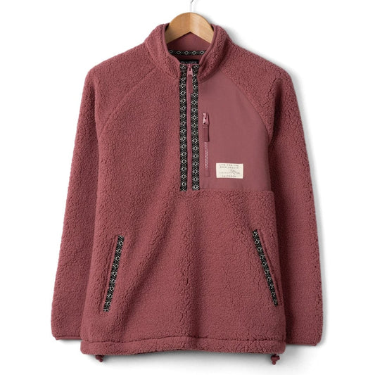 Front view of a Saltrock womens Lya fleece pullover on a wooden hanger against a white background
