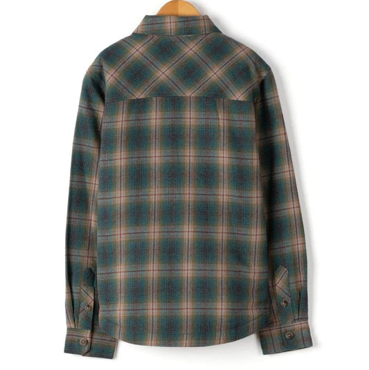 Dark Teal check kids Saltrock lined shirt on a wooden hanger against a white background