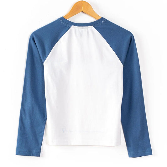 Long-sleeve Saltrock kids t-shirt with blue sleeves and white body on a wooden hanger against a white background