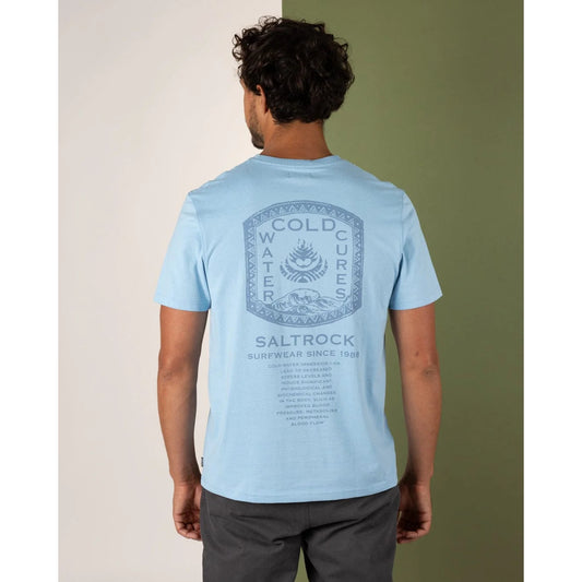 Person wearing a light blue t-shirt with 'Cold Water Cures' and 'Saltrock' branding.