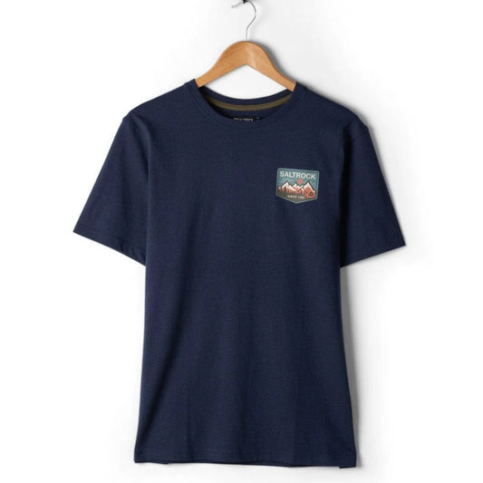 Navy blue t-shirt with a logo on a wooden hanger against a white background