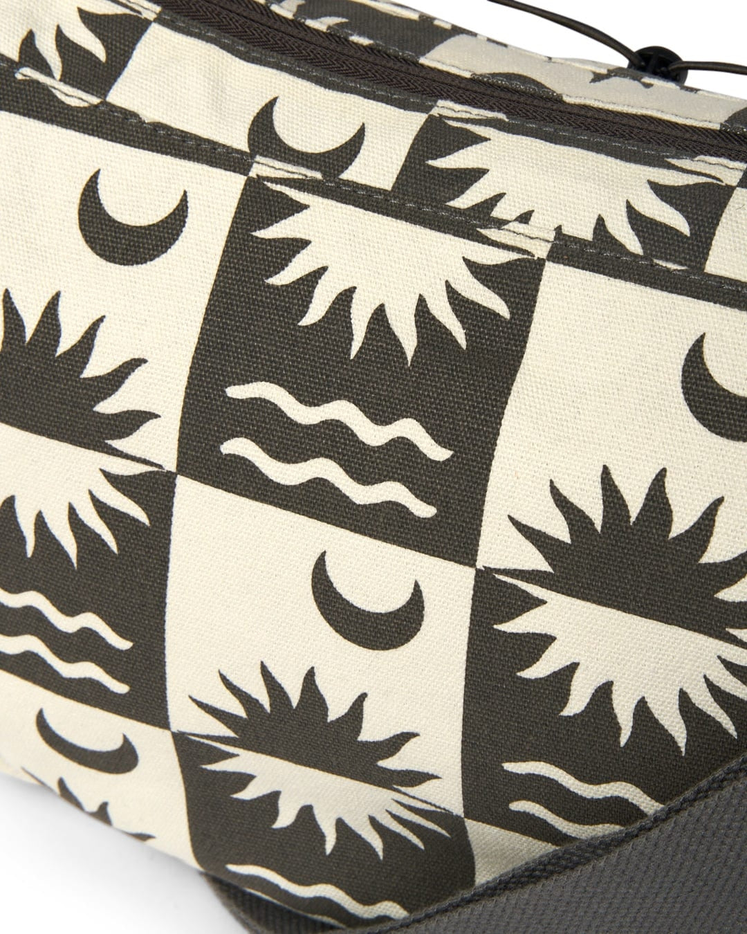 Saltrock sling bag cream featuring a unique sun and wave pattern for stylish everyday use