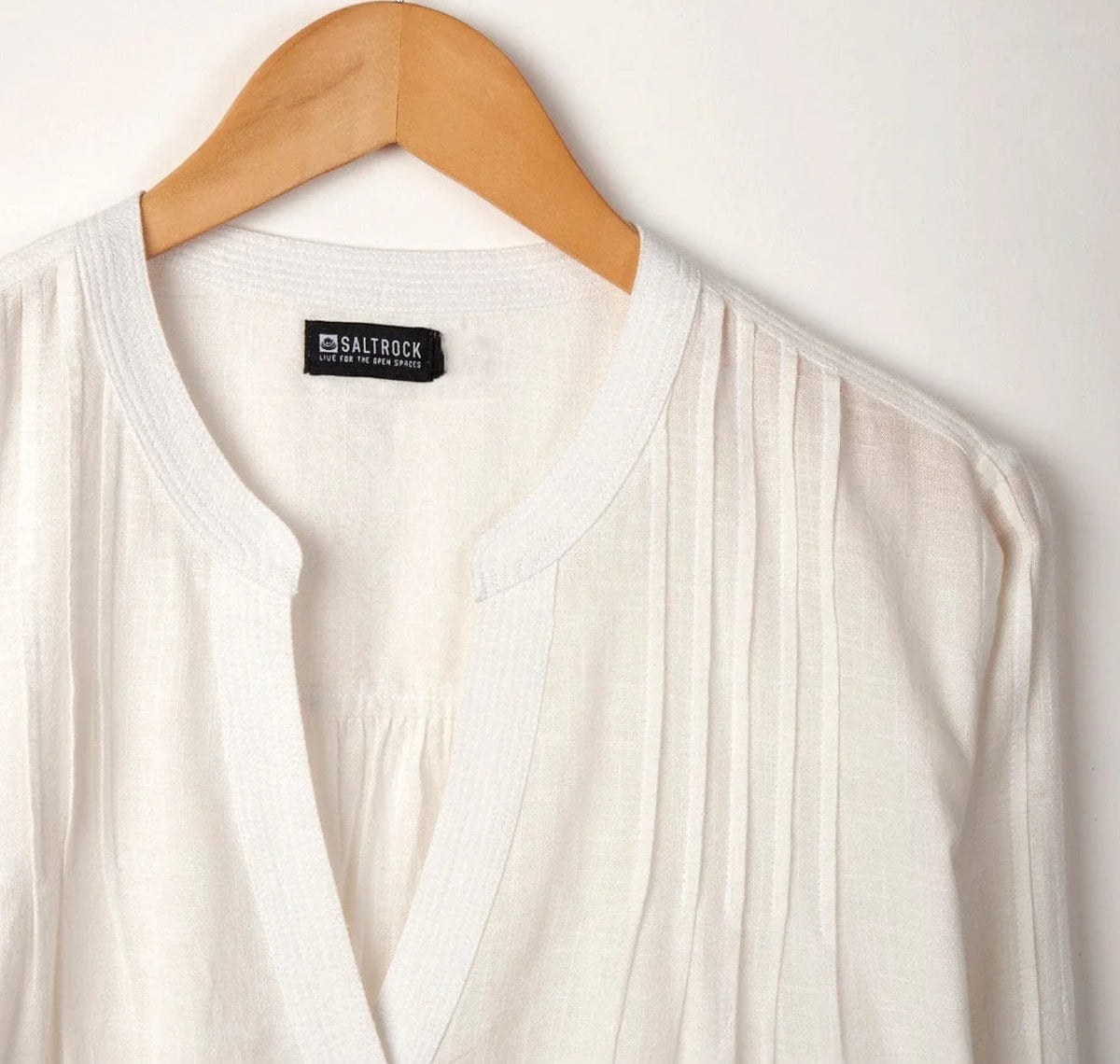 Women's mandarin neck white Karthi shirt from Saltrock with pintuck shoudler detail.